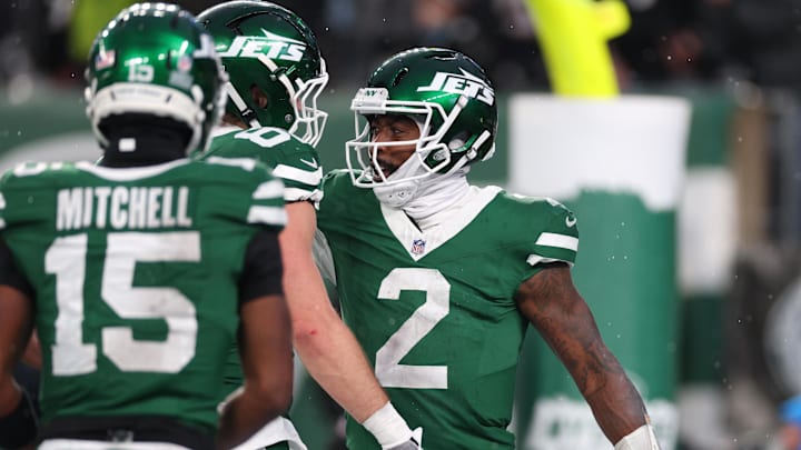 Nov 30, 2025; East Rutherford, New Jersey, USA; New York Jets quarterback Tyrod Taylor (2) reacts after a touchdown against the Atlanta Falcons during the second half at MetLife Stadium. Mandatory Credit: Vincent Carchietta-Imagn Images