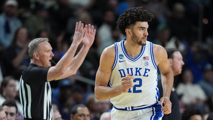 Mar 19, 2026; Greenville, SC, USA; Duke Blue Devils forward Cameron Boozer (12) reacts Siena Saints in the first half during a first round game of the men's 2026 NCAA Tournament at Bon Secours Wellness Arena. Mandatory Credit: Jim Dedmon-Imagn Images Mar 19, 2026; Greenville, SC, USA; Duke Blue Devils forward Cameron Boozer (12) reacts Siena Saints in the first half during a first round game of the men's 2026 NCAA Tournament at Bon Secours Wellness Arena. Mandatory Credit: Jim Dedmon-Imagn Images