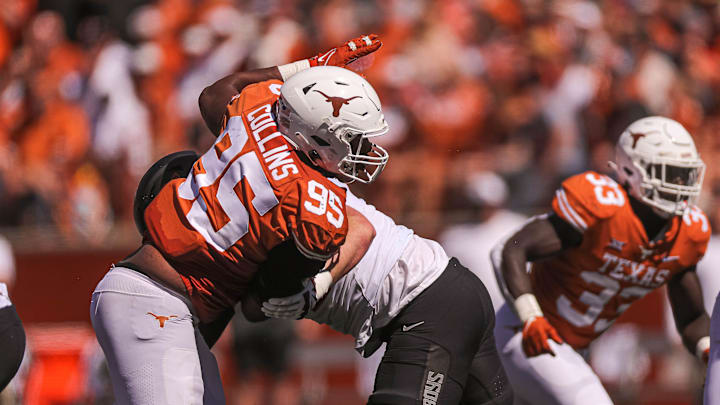 Texas defensive lineman Alfred Collins (95) rushes the passer during the game at Darrell K. Royal Memorial Stadium on Saturday, Oct. 16, 2021. Oklahoma defeated Texas 32-24 and handed the Longhorns their first home loss of the season. Texas defensive lineman Alfred Collins (95) rushes the passer during the game at Darrell K. Royal Memorial Stadium on Saturday, Oct. 16, 2021. Oklahoma defeated Texas 32-24 and handed the Longhorns their first home loss of the season.