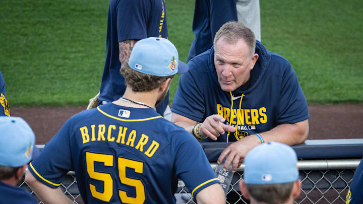Milwaukee Brewers manager Pat Murphy (49) talks with Milwaukee Brewers pitching prospect Ryan Birchard during spring training workouts Tuesday, February 17, 2026, at American Family Fields of Phoenix in Phoenix, Arizona.