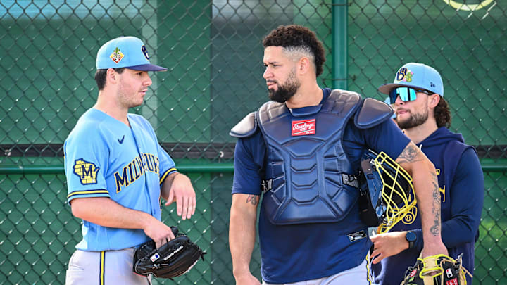 Milwaukee Brewers pitcher Logan Henderson (43) talks with catcher Gary Sanchez during spring training workouts Sunday, February 15, 2026, at American Family Fields of Phoenix in Phoenix, Arizona.