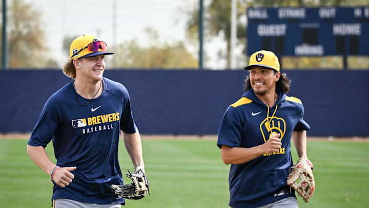 Milwaukee Brewers infielders Cooper Pratt and Anthony Seigler run off the field during spring training workouts Monday, February 17, 2025, at American Family Fields of Phoenix in Phoenix, Arizona.