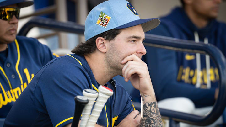 Milwaukee Brewers infield prospect Andrew Fischer watches the major leaguers practice during spring training workouts Tuesday, February 17, 2026, at American Family Fields of Phoenix in Phoenix, Arizona.