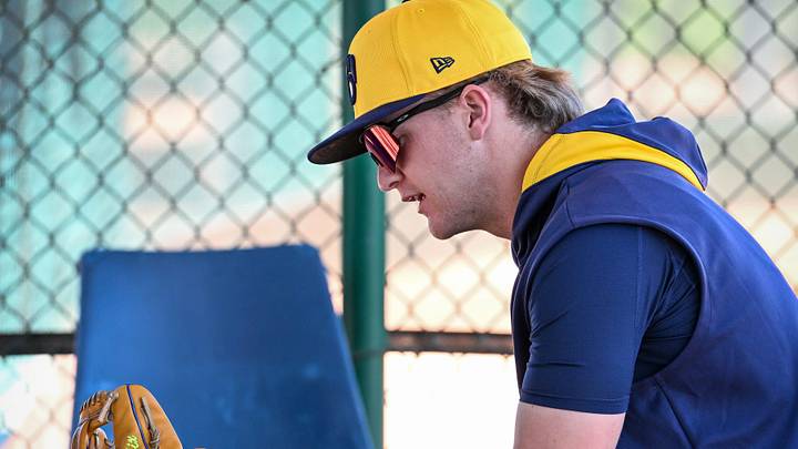 Milwaukee Brewers infielder Cooper Pratt sits in the dugout during spring training workouts Saturday, February 15, 2025, at the American Family Fields of Phoenix in Phoenix, Arizona. Milwaukee Brewers infielder Cooper Pratt sits in the dugout during spring training workouts Saturday, February 15, 2025, at the American Family Fields of Phoenix in Phoenix, Arizona.