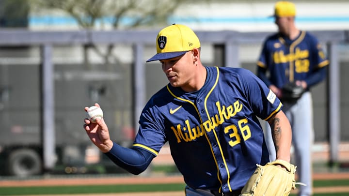 Milwaukee Brewers pitcher Tobias Myers (36) tosses a ball into a bin during spring training workouts Saturday, February 15, 2025, at the American Family Fields of Phoenix in Phoenix, Arizona.