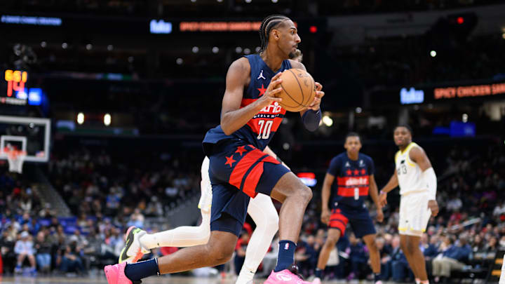 Mar 5, 2025; Washington, District of Columbia, USA; Washington Wizards forward Alex Sarr (20) handles the ball against the Utah Jazz during the second quarter at Capital One Arena. Mandatory Credit: Reggie Hildred-Imagn Images