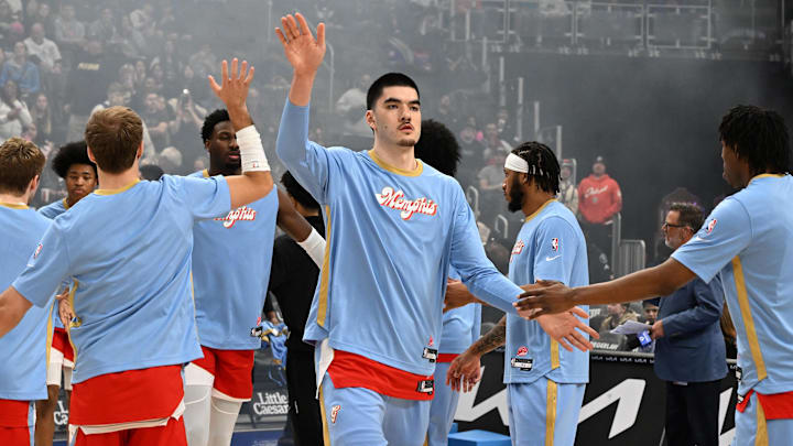 Apr 5, 2025; Detroit, Michigan, USA;  Memphis Grizzlies center Zach Edey (14) during payers introductions before their game against the Detroit Pistons at Little Caesars Arena. Mandatory Credit: Lon Horwedel-Imagn Images