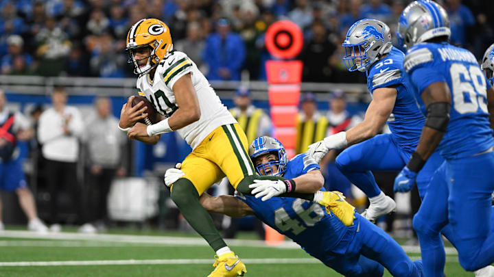 Green Bay Packers quarterback Jordan Love (10) gets tackled by Detroit Lions linebacker Jack Campbell (46). Green Bay Packers quarterback Jordan Love (10) gets tackled by Detroit Lions linebacker Jack Campbell (46).