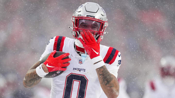 Jan 25, 2026; Denver, CO, USA; New England Patriots cornerback Christian Gonzalez (0) reacts after an interception against the Denver Broncos  during the second half in the 2026 AFC Championship Game at Empower Field at Mile High. Mandatory Credit: Ron Chenoy-Imagn Images