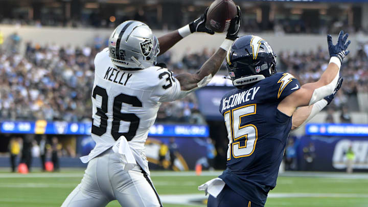 Nov 30, 2025; Inglewood, California, USA; Las Vegas Raiders cornerback Kyu Blu Kelly (36) intercepts a pass from Los Angeles Chargers wide receiver Ladd McConkey (15) during the first half at SoFi Stadium. Mandatory Credit: Jayne Kamin-Oncea-Imagn Images Nov 30, 2025; Inglewood, California, USA; Las Vegas Raiders cornerback Kyu Blu Kelly (36) intercepts a pass from Los Angeles Chargers wide receiver Ladd McConkey (15) during the first half at SoFi Stadium. Mandatory Credit: Jayne Kamin-Oncea-Imagn Images