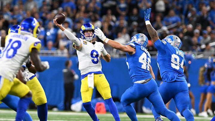 Sep 8, 2024; Detroit, Michigan, USA; Los Angeles Rams quarterback Matthew Stafford (9) throws a pass against the Detroit Lions in the first quarter at Ford Field. Mandatory Credit: Lon Horwedel-Imagn Images