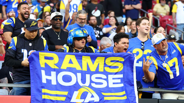 Dec 7, 2025; Glendale, Arizona, USA; Los Angeles Rams fans react during the second half at State Farm Stadium. Mandatory Credit: Mark J. Rebilas-Imagn Images Dec 7, 2025; Glendale, Arizona, USA; Los Angeles Rams fans react during the second half at State Farm Stadium. Mandatory Credit: Mark J. Rebilas-Imagn Images