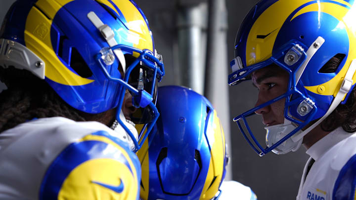 Jan 10, 2026; Charlotte, NC, USA; Los Angeles Rams wide receiver Davante Adams (17) and wide receiver Puka Nacua (12) prepare to take the field before the first half during the NFC Wild Card Round game at Bank of America Stadium. Mandatory Credit: Jim Dedmon-Imagn Images