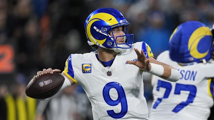 Jan 10, 2026; Charlotte, NC, USA; Los Angeles Rams quarterback Matthew Stafford (9) drops back to pass against the Carolina Panthers in the first half during the NFC Wild Card Round game at Bank of America Stadium. Mandatory Credit: Jim Dedmon-Imagn Images