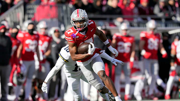Ohio State Buckeyes wide receiver Carnell Tate (17) makes a catch against Michigan Wolverines defensive back Zeke Berry (10) during the second quarter of the NCAA football game at Ohio Stadium in Columbus on Saturday, Nov. 30, 2024.