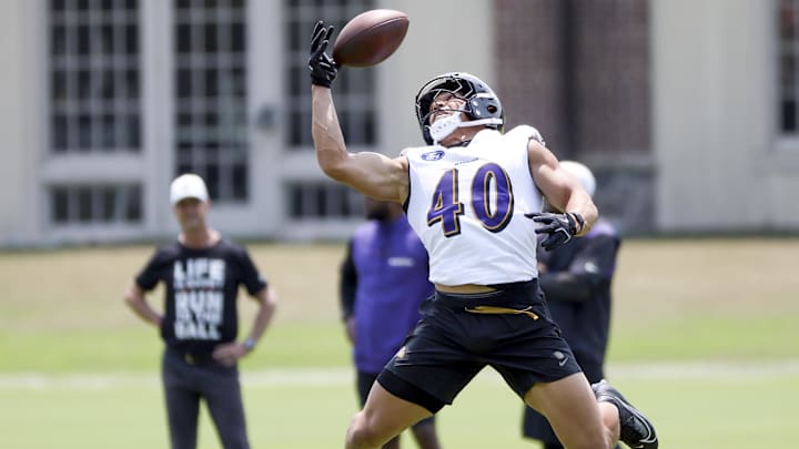 Jun 11, 2025; Baltimore, MD, USA; Baltimore Ravens linebacker Teddye Buchanan (40) makes a catch during an NFL OTA at Under Armour Performance Center. Mandatory Credit: Daniel Kucin Jr.-Imagn Images