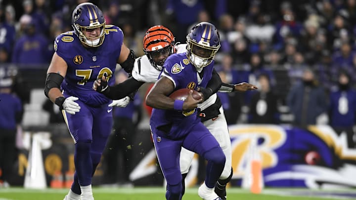 Nov 27, 2025; Baltimore, Maryland, USA; Baltimore Ravens quarterback Lamar Jackson (8) rushes the ball against the Cincinnati Bengals during the first half at M&T Bank Stadium. Mandatory Credit: Tommy Gilligan-Imagn Images