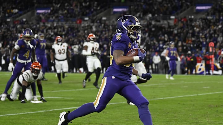Nov 27, 2025; Baltimore, Maryland, USA; Baltimore Ravens running back Keaton Mitchell (34) rushes for a touchdown against the Cincinnati Bengals during the second half at M&T Bank Stadium. Mandatory Credit: Tommy Gilligan-Imagn Images