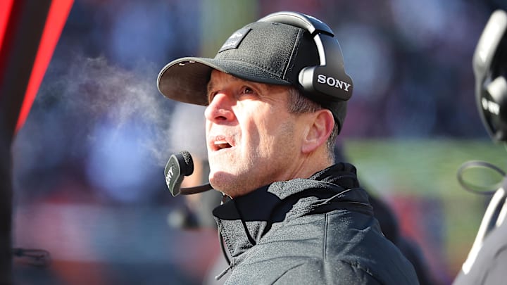 Dec 14, 2025; Cincinnati, Ohio, USA; Baltimore Ravens head coach John Harbaugh checks a replay during the second quarter against the Cincinnati Bengals at Paycor Stadium. Mandatory Credit: Joseph Maiorana-Imagn Images
