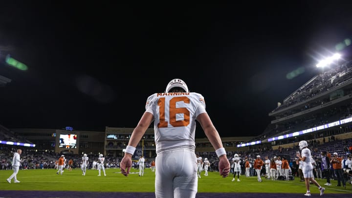 Texas Longhorns quarterback Arch Manning (16) warms up ahead of the game against Texas Christian