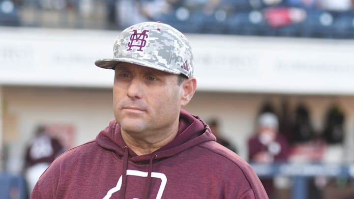Mississippi State head coach Chris Lemonis listens to the ground rules before the game against Ole