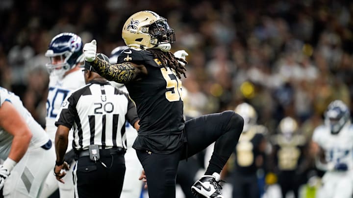 New Orleans Saints linebacker Demario Davis (56) celebrates tackling Tennessee Titans quarterback New Orleans Saints linebacker Demario Davis (56) celebrates tackling Tennessee Titans quarterback