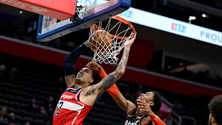 Jan 27, 2024; Detroit, Michigan, USA; Washington Wizards forward Kyle Kuzma (33) dunks the ball over
