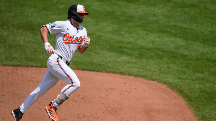 Jul 31, 2024; Baltimore, Maryland, USA; Baltimore Orioles second baseman Jackson Holliday (7) rounds third base after hitting a home run against the Toronto Blue Jays during the fifth inning at Oriole Park at Camden Yards. Mandatory Credit: Reggie Hildred-USA TODAY Sports