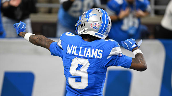 Sep 8, 2024; Detroit, Michigan, USA; Detroit Lions wide receiver Jameson Williams (9) celebrates in front of the fans after catching a touchdown pass against the Los Angeles Rams in the third quarter at Ford Field. Mandatory Credit: Lon Horwedel-Imagn Images