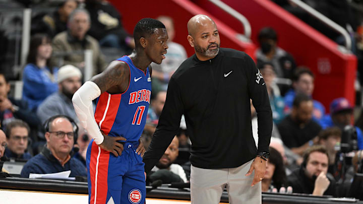 Detroit Pistons newly acquired guard, Dennis Schroder (17), talks with Detroit Pistons head coach J.B. Bickerstaff in the second quarter of their game against the Charlotte Hornets at Little Caesars Arena. 