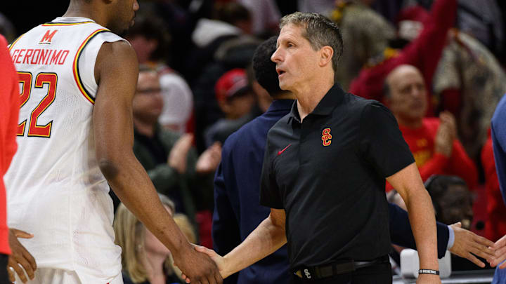 USC coach Eric Musselman shakes hands with Maryland players after a Trojans loss. 