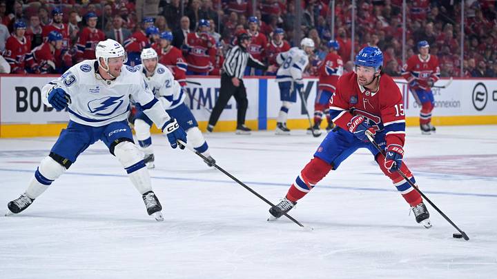 Apr 24, 2026; Montreal, Quebec, CAN; Montreal Canadiens forward Alex Newhook (15) plays the puck and Tampa Bay Lightning defenseman Darren Raddysh (43) defends during the third period in game three of the first round of the 2026 Stanley Cup Playoffs at the Bell Centre. Mandatory Credit: Eric Bolte-Imagn Images Apr 24, 2026; Montreal, Quebec, CAN; Montreal Canadiens forward Alex Newhook (15) plays the puck and Tampa Bay Lightning defenseman Darren Raddysh (43) defends during the third period in game three of the first round of the 2026 Stanley Cup Playoffs at the Bell Centre. Mandatory Credit: Eric Bolte-Imagn Images