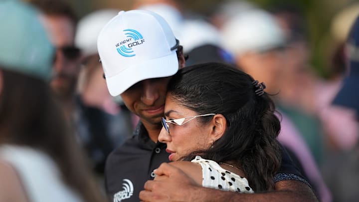 May 17, 2026: Aaron Rai reacts with his wife, Gaurika Bishnoi on the 18th hole during the final round of the PGA Championship golf tournament.