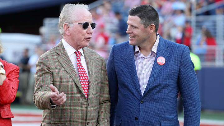 Oct 23, 2021; Oxford, Mississippi, USA; Mississippi Rebels former quarterback Archie Manning talks with Mississippi Rebels athletic director Keith Carter during half time at Vaught-Hemingway Stadium. Mandatory Credit: Petre Thomas-USA TODAY Sports