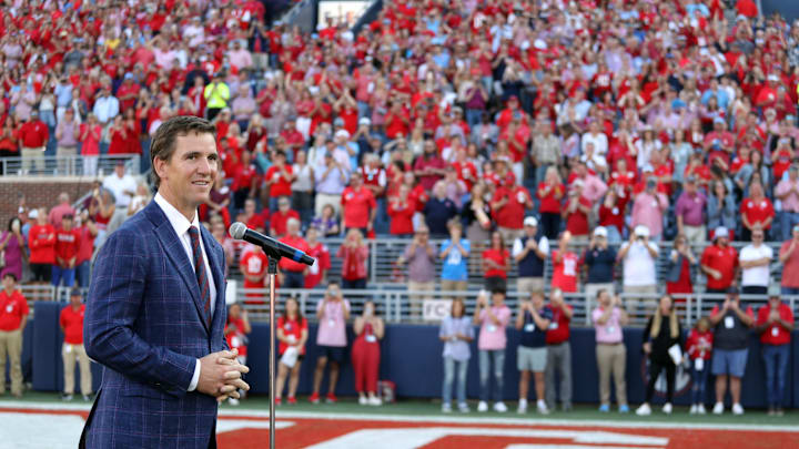 Oct 23, 2021; Oxford, Mississippi, USA; Mississippi Rebels former quarterback Eli Manning speaks on what an honor it is to have his number 10 jersey retired at Mississippi during half time at Vaught-Hemingway Stadium. Mandatory Credit: Petre Thomas-Imagn Images