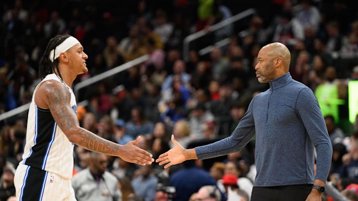 Mar 21, 2025; Washington, District of Columbia, USA; Orlando Magic forward Paolo Banchero (5) and head coach Jamahl Mosley react during the second quarter against the Washington Wizards at Capital One Arena. Mandatory Credit: Reggie Hildred-Imagn Images Mar 21, 2025; Washington, District of Columbia, USA; Orlando Magic forward Paolo Banchero (5) and head coach Jamahl Mosley react during the second quarter against the Washington Wizards at Capital One Arena. Mandatory Credit: Reggie Hildred-Imagn Images