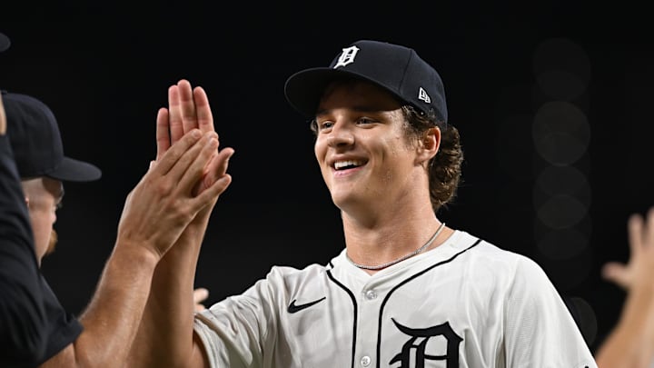 Sep 25, 2024; Detroit, Michigan, USA;  Detroit Tigers pitcher Jackson Jobe (21) celebrates with his teammates after getting the last out against the Tampa Bay Rays in his major league debut in the ninth inning at Comerica Park. 