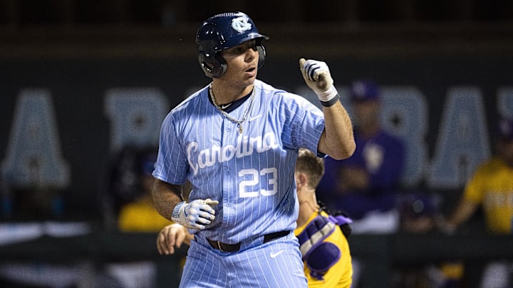 Jun 2, 2024; Chapel Hill, NC, USA; North Carolina Tar Heels designated hitter Alberto Osuna (23) reacts to earning a walk against the Louisiana State Tigers  in the ninth inning of the Div. I NCAA baseball regional at Boshamer Stadium.  Mandatory Credit: Jeffrey Camarati-Imagn Images

