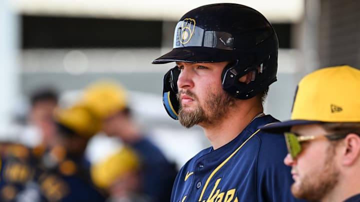 Milwaukee Brewers first base prospect Blake Burke stands in the dugout during spring training workouts Monday, February 17, 2025, at American Family Fields of Phoenix in Phoenix, Arizona.