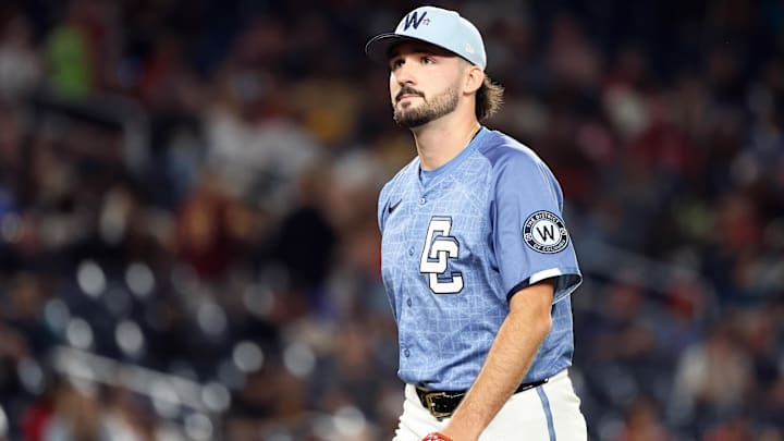 Aug 29, 2025; Washington, District of Columbia, USA; Washington Nationals pitcher Cole Henry (99) looks on during the eighth inning against the Tampa Bay Rays at Nationals Park. 