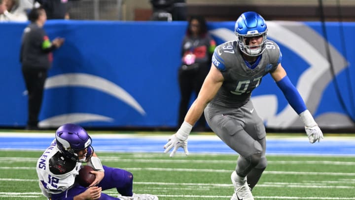 Jan 7, 2024; Detroit, Michigan, USA; Detroit Lions defensive end Aidan Hutchinson (97) celebrates after sacking Minnesota Vikings quarterback Nick Mullens (12) in the second quarter at Ford Field. Mandatory Credit: Lon Horwedel-USA TODAY Sports