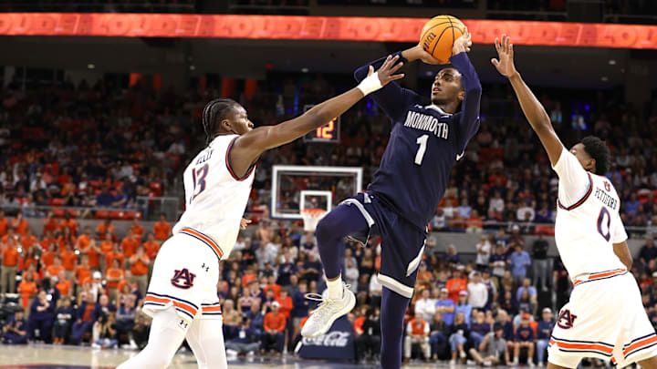 Monmouth Hawks guard Abdi Bashir Jr. (1) 