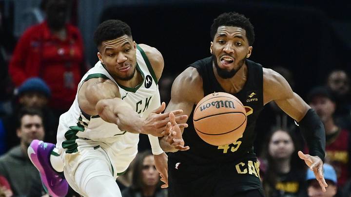 Milwaukee Bucks forward Giannis Antetokounmpo (34) and Cleveland Cavaliers guard Donovan Mitchell (45) go for a loose ball during the first half at Rocket Mortgage FieldHouse. Mandatory Credit: Ken Blaze-Imagn Images Milwaukee Bucks forward Giannis Antetokounmpo (34) and Cleveland Cavaliers guard Donovan Mitchell (45) go for a loose ball during the first half at Rocket Mortgage FieldHouse. Mandatory Credit: Ken Blaze-Imagn Images