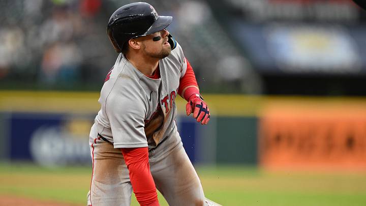 May 5, 2026; Detroit, Michigan, USA; Boston Red Sox third baseman Caleb Durbin (5) looks to the umpire to see if he was safe sliding into third base against the Detroit Tigers in the third inning at Comerica Park. Mandatory Credit: Lon Horwedel-Imagn Images