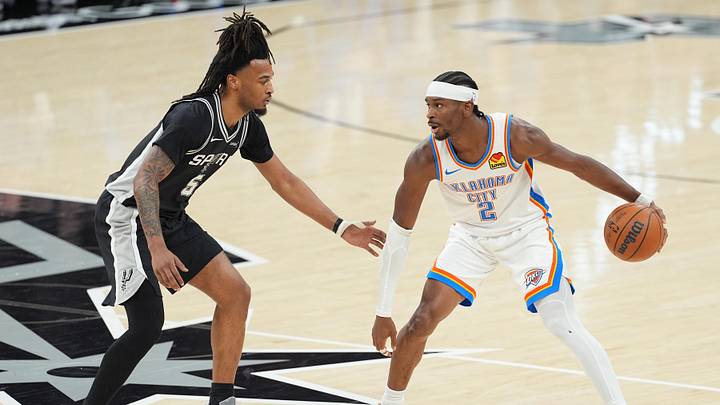 May 28, 2026; San Antonio, Texas, USA; Oklahoma City Thunder guard Shai Gilgeous-Alexander (2) dribbles the ball against San Antonio Spurs guard Stephon Castle (5) in the first half during game six of the western conference finals for the 2026 NBA playoffs at Frost Bank Center. Mandatory Credit: Daniel Dunn-Imagn Images