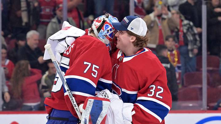 Mar 26, 2026; Montreal, Quebec, CAN; Montreal Canadiens goalie Jakub Dobes (75) celebrates the win against the Columbus Blue Jackets with teammate goalie Jacob Fowler (32) at the Bell Centre. Mandatory Credit: Eric Bolte-Imagn Images