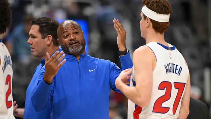 Oct 5, 2026; Detroit, Michigan, USA;  Detroit Pistons head coach J.B. Bickerstaff talks with player Kevin Huerter (27) during a timeout against the Phoenix Suns in the first quarter at Little Caesars Arena.  Mandatory Credit: Lon Horwedel-Imagn Images