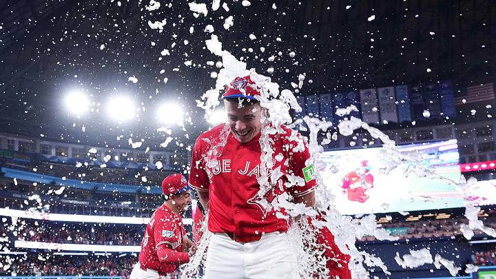 Jul 1, 2026; Toronto, Ontario, CAN; Toronto Blue Jays designated hitter Sean Keys (20) gets the water bucket poured on him against the New York Mets at the end of the ninth inning at Rogers Centre. Mandatory Credit: Nick Turchiaro-Imagn Images TPX IMAGES OF THE DAY Jul 1, 2026; Toronto, Ontario, CAN; Toronto Blue Jays designated hitter Sean Keys (20) gets the water bucket poured on him against the New York Mets at the end of the ninth inning at Rogers Centre. Mandatory Credit: Nick Turchiaro-Imagn Images TPX IMAGES OF THE DAY
