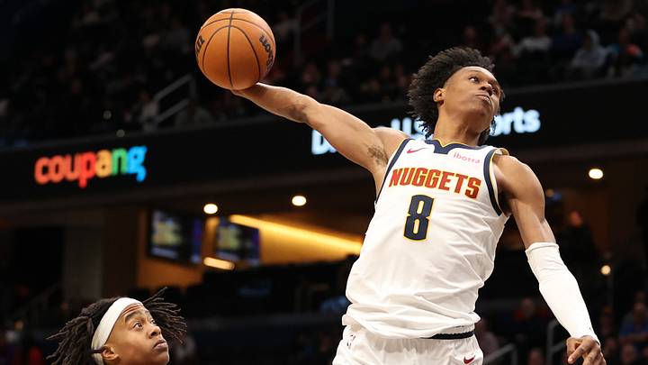 Jan 22, 2026; Washington, District of Columbia, USA; Denver Nuggets guard Peyton Watson (8) attempts a dunk over Washington Wizards guard Tre Johnson (12) during the second half at Capital One Arena. Mandatory Credit: Daniel Kucin Jr.-Imagn Images Jan 22, 2026; Washington, District of Columbia, USA; Denver Nuggets guard Peyton Watson (8) attempts a dunk over Washington Wizards guard Tre Johnson (12) during the second half at Capital One Arena. Mandatory Credit: Daniel Kucin Jr.-Imagn Images
