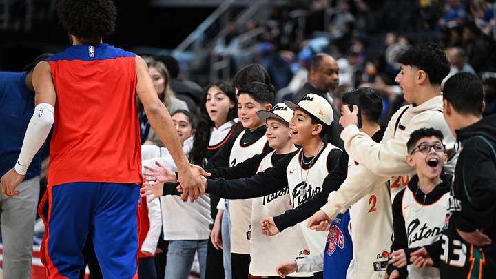 Jan 1, 2025; Detroit, Michigan, USA; Detroit Pistons guard Cade Cunningham (2) greets young fans lined up court side during pregame warmups before their game against the Orlando Magic at Little Caesars Arena. Mandatory Credit: Lon Horwedel-Imagn Images Jan 1, 2025; Detroit, Michigan, USA; Detroit Pistons guard Cade Cunningham (2) greets young fans lined up court side during pregame warmups before their game against the Orlando Magic at Little Caesars Arena. Mandatory Credit: Lon Horwedel-Imagn Images